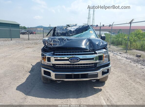 1FTEX1EP6JKG08236 2018 FORD F150 Black Rear interior view