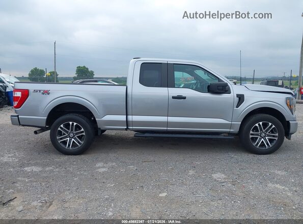 1FTEX1EP7PFA81034 2023 FORD F150 Gray Vista interior trasera