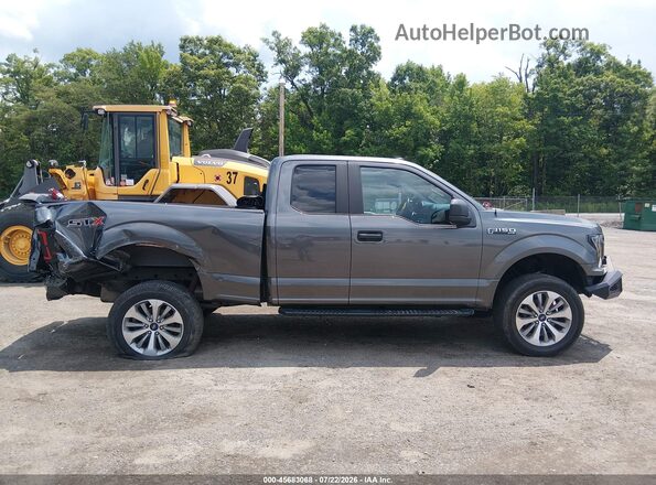 1FTEX1EP9JFD11244 2018 FORD F150 Серый Вид задней части салона