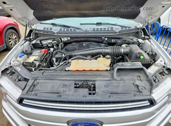 1FTFW1E18JFE25237 2018 FORD F150 Silver Vista interior trasera