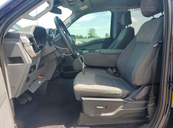 1FTFW1E52PKD59352 2023 FORD F150 Blue Vista interior delantera