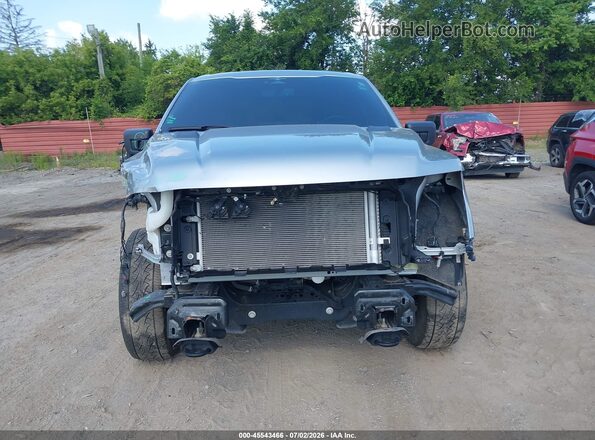 1FTFW1E53PFD10668 2023 FORD F150 Silver Vista interior trasera
