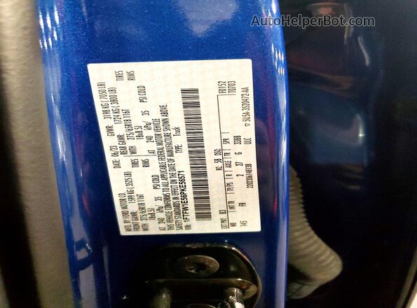 1FTFW1E56PKE56571 2023 FORD F150 Blue Vista del compartimento del motor