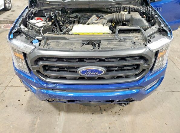 1FTFW1E56PKE56571 2023 FORD F150 Blue Vista interior trasera