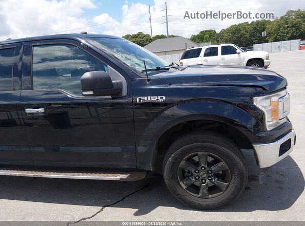 1FTFW1E59JKF17502 2018 FORD F150 Black Vista interior trasera