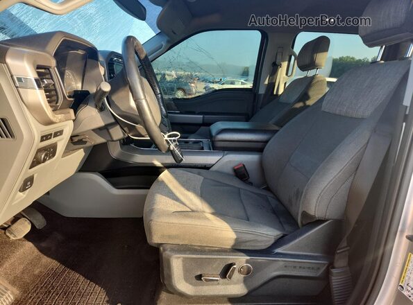 1FTFW1E59MFA73678 2021 FORD F150 Silver Front interior view