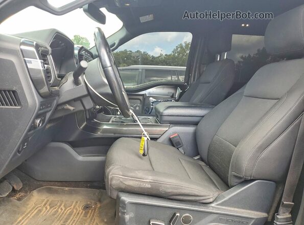 1FTFW1E84MFA19909 2021 FORD F150 Green Front interior view