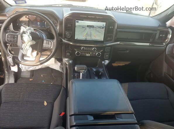 1FTFW1E84PKD26038 2023 FORD F150 Черный Вид панели приборов