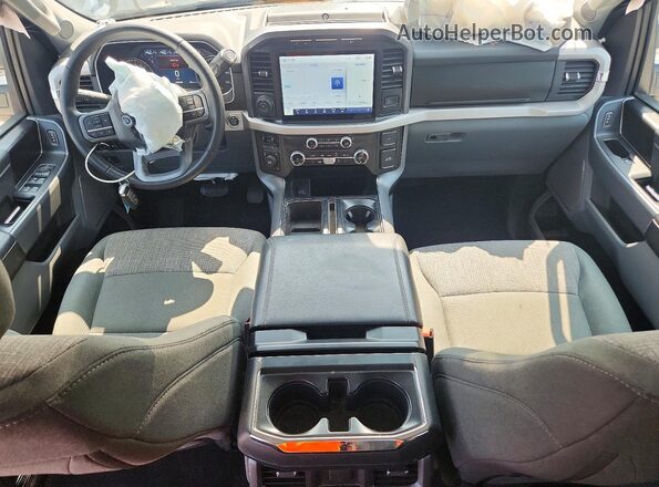 1FTFW1E87PFD30982 2023 FORD F150 Серебряный Вид панели приборов