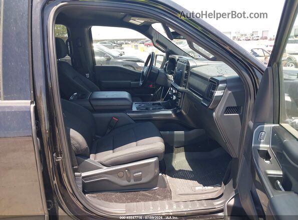 1FTFW1E89NKE79415 2022 FORD F150 Черный Вид салона спереди
