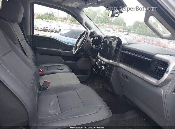 1FTFW1ED9PFB28061 2023 FORD F150 Серый Вид салона спереди