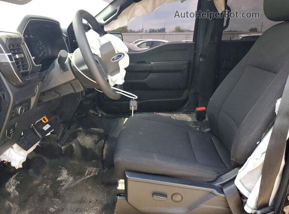 1FTFW1P84PKD67993 2023 FORD F150 Черный Вид салона спереди