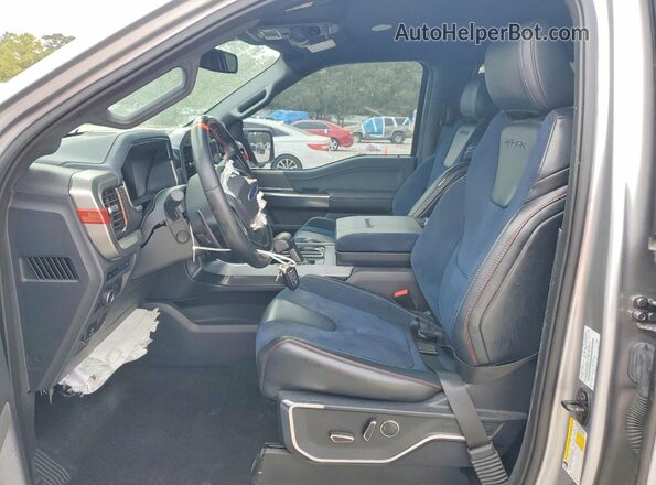 1FTFW1RG6PFA04379 2023 FORD F150 Silver Вид салону спереду