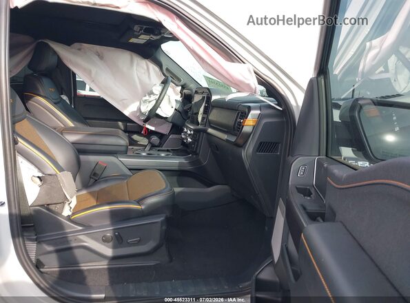 1FTFW4L59TFA51165 2026 FORD F150 Gray Vista interior delantera