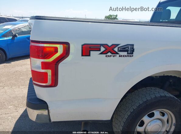 1FTFX1E51LKE11433 2020 FORD F150 White Vista interior trasera