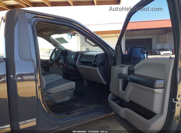 1FTMF1C86HKD19152 2017 FORD F150 Gray Вид салону спереду