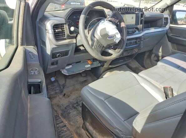 1FTMF1CB5PKE71904 2023 FORD F150 Белый Вид панели приборов