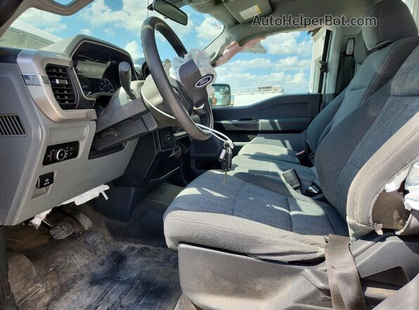 1FTMF1CP8PKF11615 2023 FORD F150 Белый Вид салона спереди