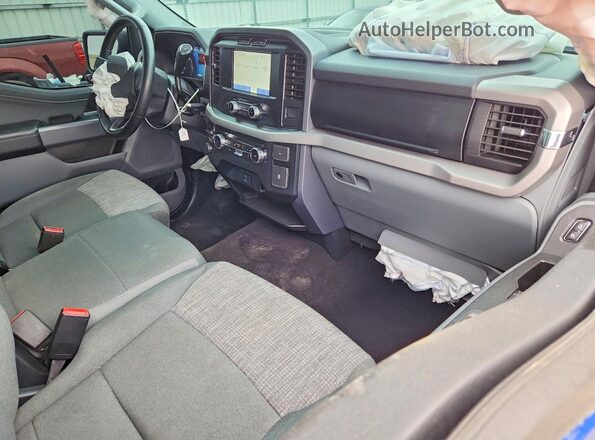 1FTMF1E50PKD21383 2023 FORD F150 Синий Вид панели приборов