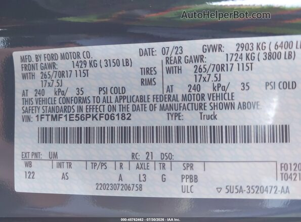 1FTMF1E56PKF06182 2023 FORD F150 Black Vista del compartimento del motor
