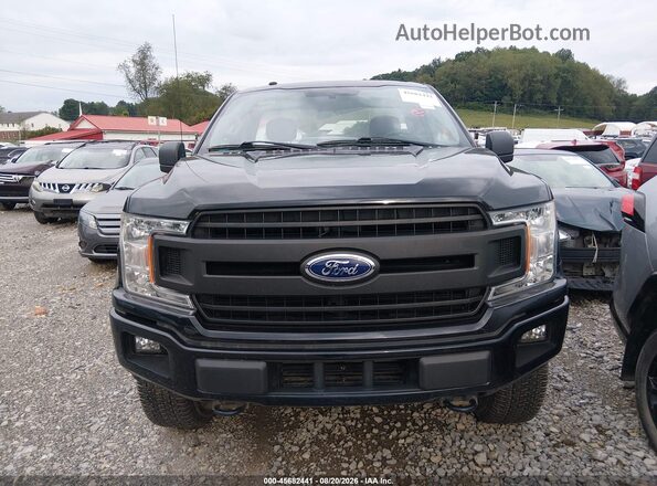 1FTMF1EP9JFA91084 2018 FORD F150 Black Widok wnętrza z tyłu