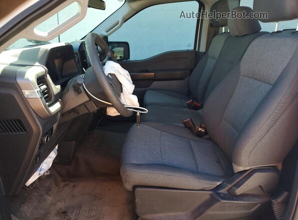 1FTMF1LP9RKF05955 2024 FORD F150 Beige Vista interior delantera