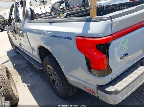 1FTVW1EV0PWG07263 2023 FORD F-150 LIGHTNING Gray Rear left