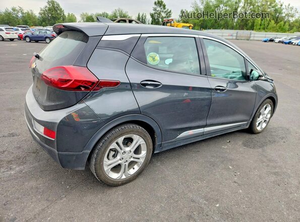1G1FW6S02J4138943 2018 CHEVROLET BOLT Gray Trasero derecho