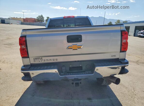 1GC1KWEY6JF263317 2018 CHEVROLET SILVERADO Silver Rear view