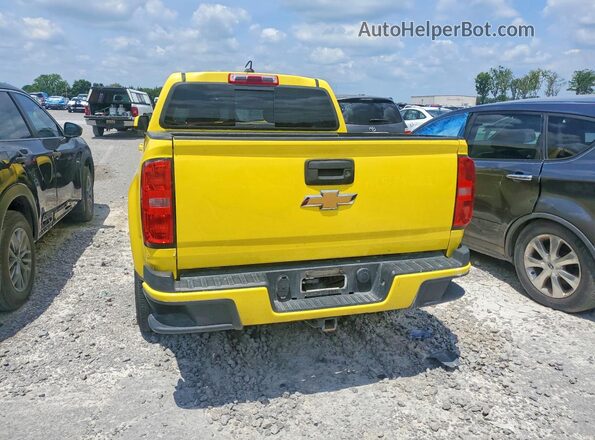 1GCGSCEN0H1249094 2017 CHEVROLET COLORADO Yellow Widok z tyłu