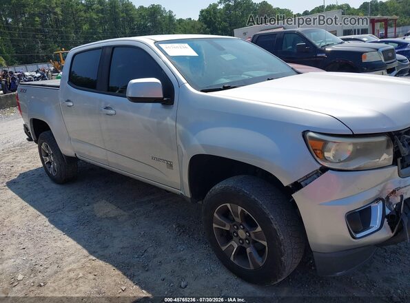 1GCGSDEN2J1114677 2018 CHEVROLET COLORADO Silver Widok wnętrza z tyłu