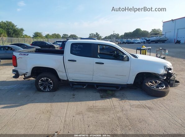 1GCGSDEN7M1231255 2021 CHEVROLET COLORADO White Widok wnętrza z tyłu