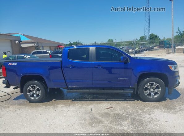 1GCGTDE32G1180988 2016 CHEVROLET COLORADO Blue Սալոնի հետևի տեսք