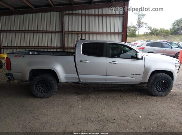 1GCGTDENXJ1250133 2018 CHEVROLET COLORADO Silver Vista interior trasera