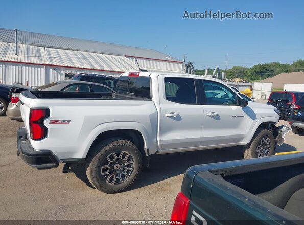 1GCPTDEKXP1217714 2023 CHEVROLET COLORADO White Widok wnętrza z tyłu