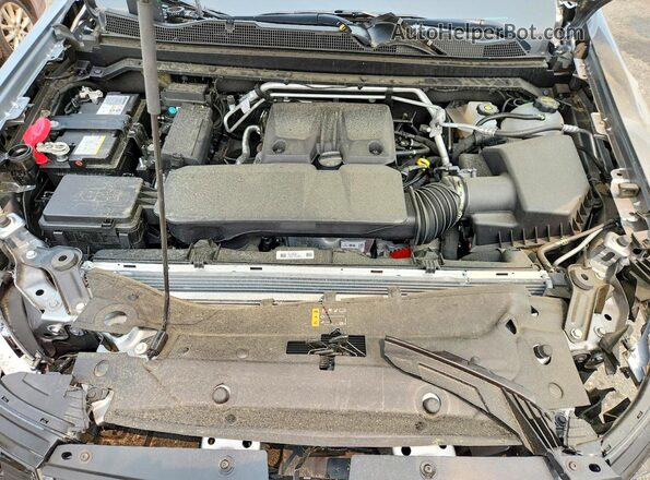 1GCPTDEKXS1245702 2025 CHEVROLET COLORADO Silver Вид задньої частини салону