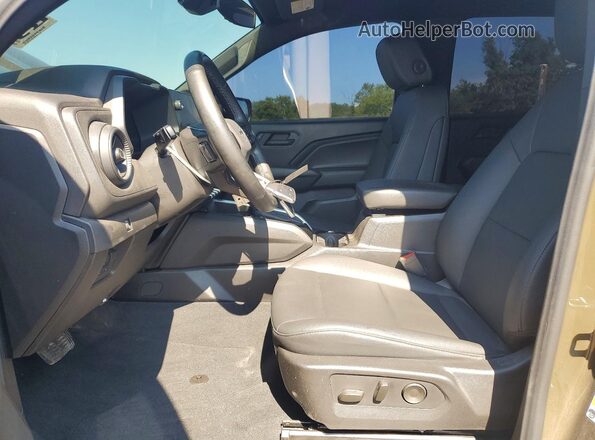 1GCPTEEK8S1159813 2025 CHEVROLET COLORADO Green წინა სალონის ხედი