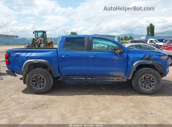 1GCPTFEKXS1207673 2025 CHEVROLET COLORADO Blue Widok wnętrza z tyłu