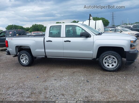 1GCVKNEH2HZ308497 2017 CHEVROLET SILVERADO Silver Вид задньої частини салону