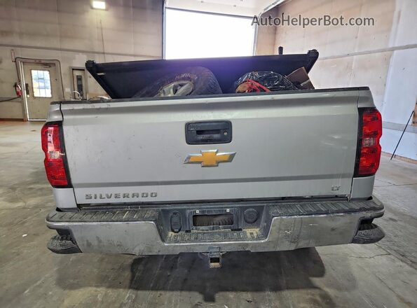 1GCVKREC0HZ308283 2017 CHEVROLET SILVERADO Silver Rear view