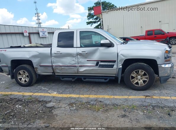 1GCVKREC2HZ187949 2017 CHEVROLET SILVERADO Серебряный Вид задней части салона