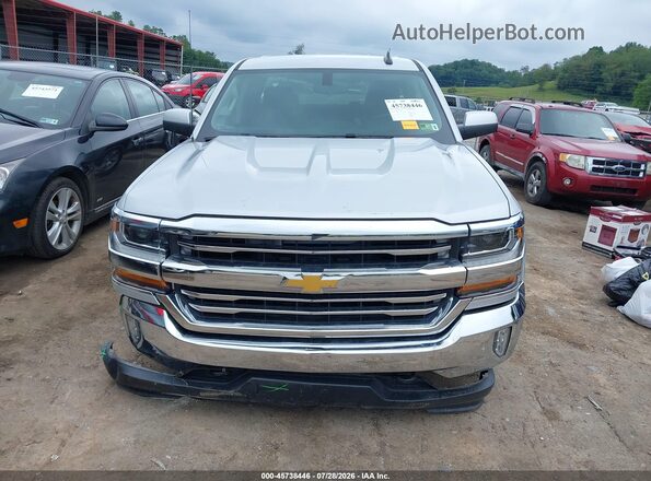 1GCVKREC7HZ129352 2017 CHEVROLET SILVERADO Silver Widok wnętrza z tyłu