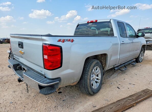 1GCVKREH0JZ299618 2018 CHEVROLET SILVERADO Silver Trasero derecho