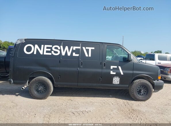 1GCWGAFF8H1128631 2017 CHEVROLET EXPRESS Black Widok wnętrza z tyłu