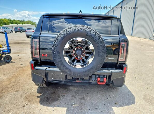 1GKB0RDC0RU105665 2024 GMC HUMMER Black Հետևի տեսք