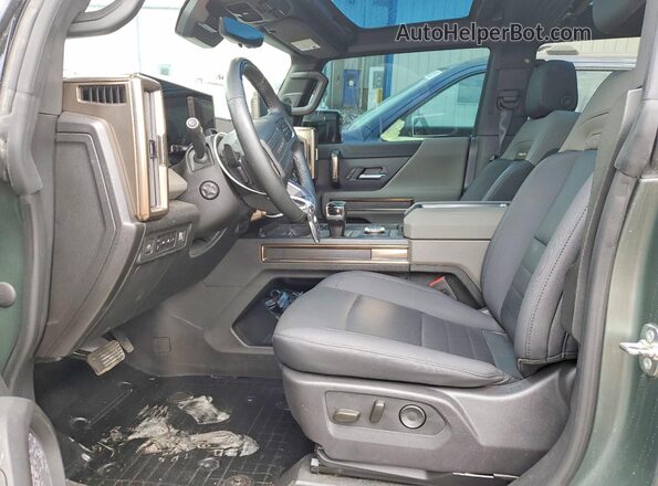 1GKB0RDC8RU103453 2024 GMC HUMMER Green წინა სალონის ხედი