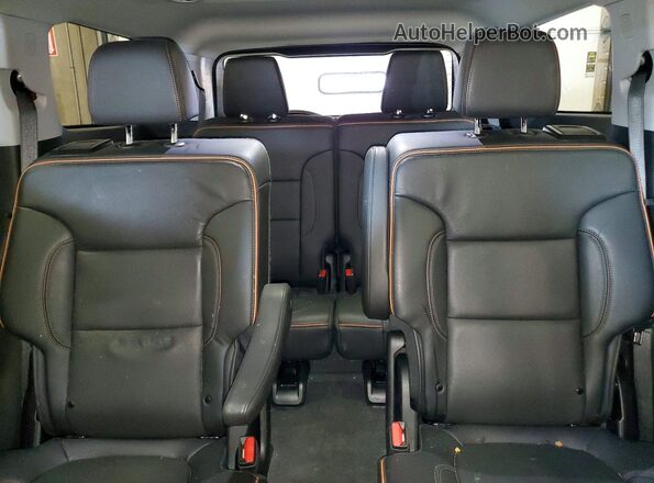 1GKKNLLS7PZ262357 2023 GMC ACADIA Red Widok tylnych siedzeń