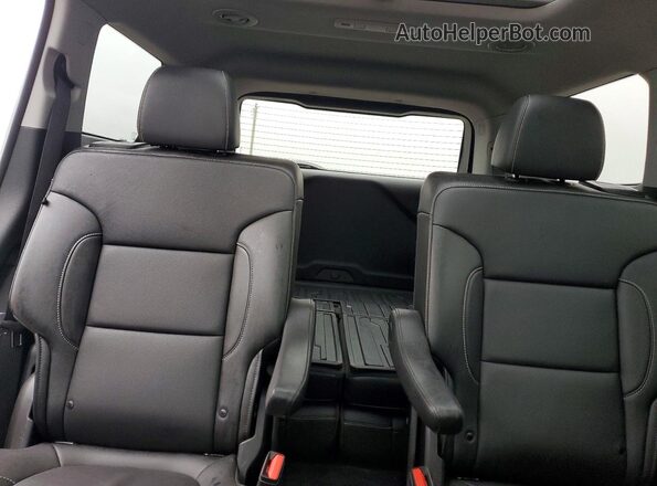1GKKNML47PZ205700 2023 GMC ACADIA White Vista de los asientos traseros