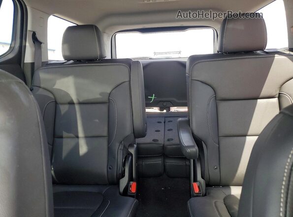 1GKKNULS3PZ265679 2023 GMC ACADIA White Vista de los asientos traseros