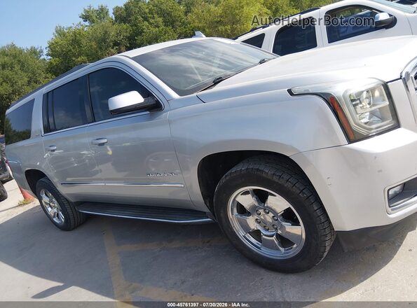 1GKS1FKC2HR168301 2017 GMC YUKON Gray Widok wnętrza z tyłu